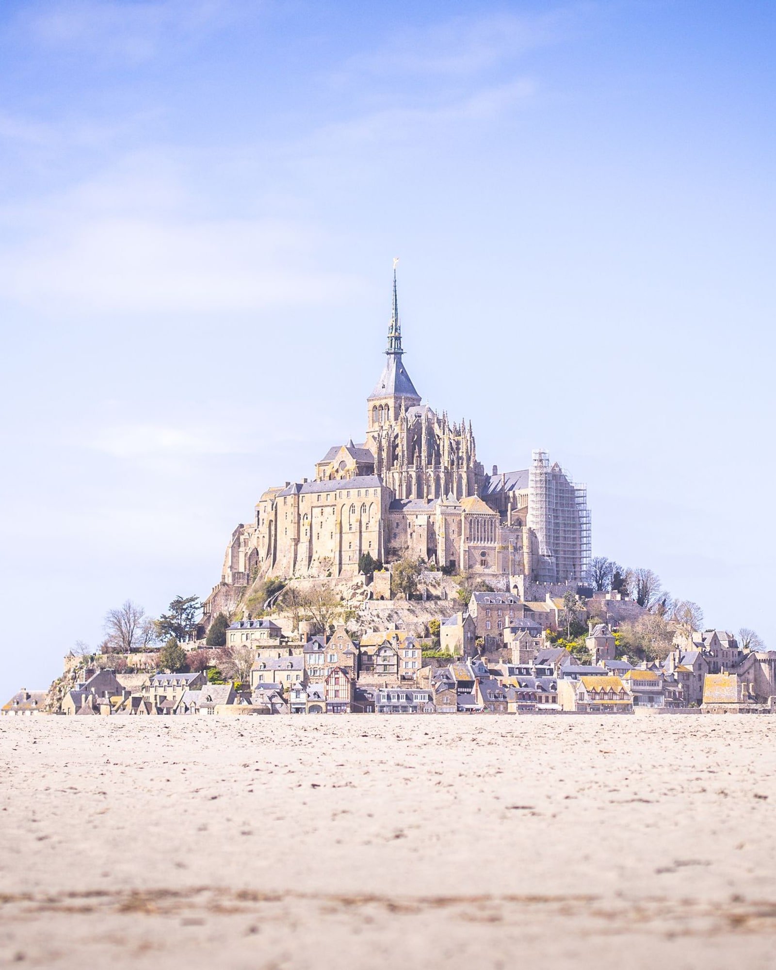 Mont Saint-Michel rises above the tidal flats in Normandy, France.