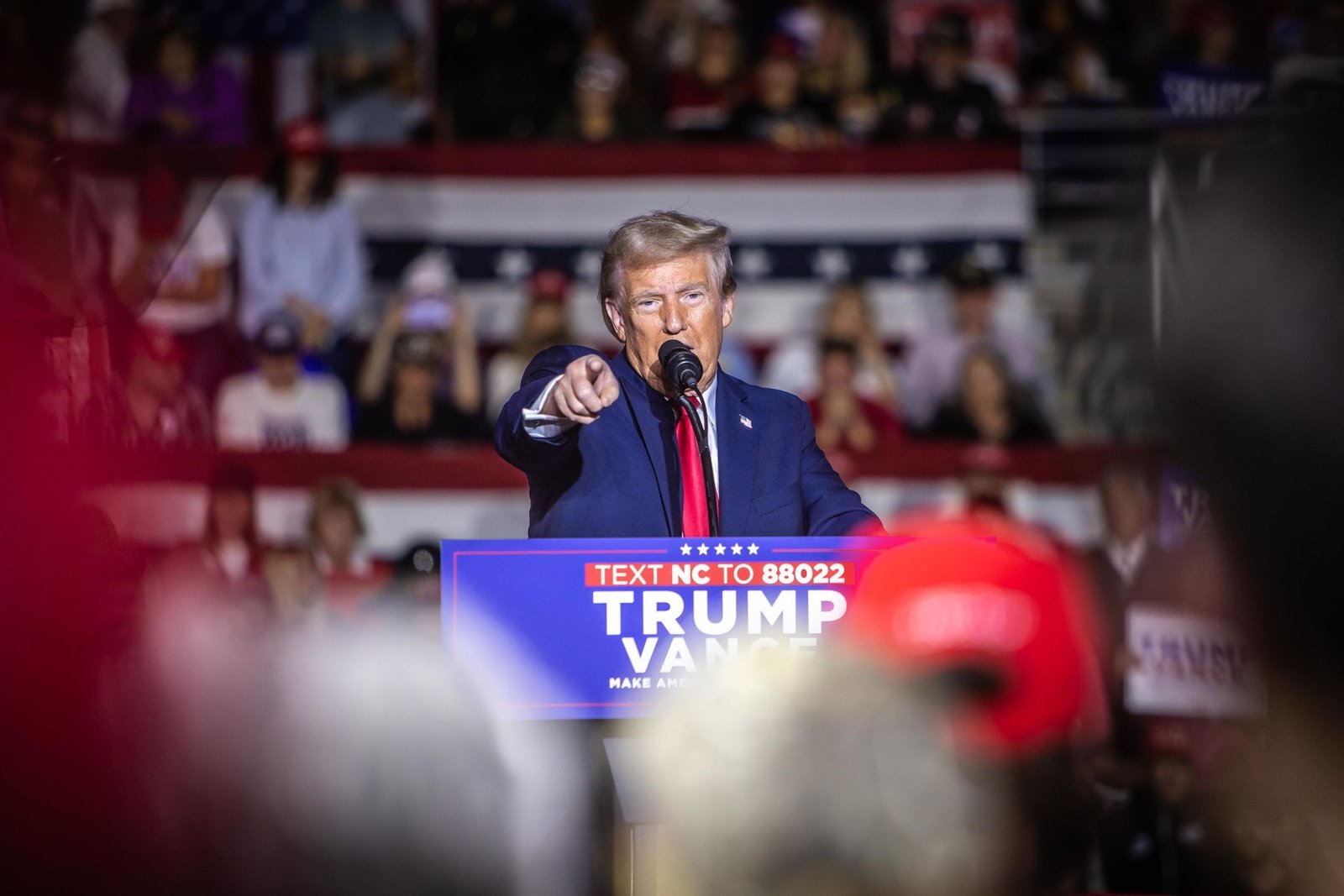 Donald Trump points to supporters at a Trump Vance 2024 campaign rally in North Carolina.